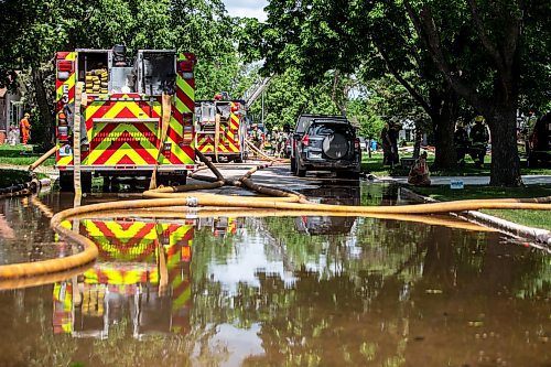 MIKAELA MACKENZIE / FREE PRESS

Fire crews at the scene of a house explosion on Camrose Bay in Transcona on Wednesday, June 26, 2024.

For Malak story.

