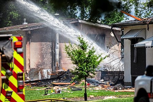 MIKAELA MACKENZIE / FREE PRESS

Fire crews at the scene of a house explosion on Camrose Bay in Transcona on Wednesday, June 26, 2024.

For Malak story.

