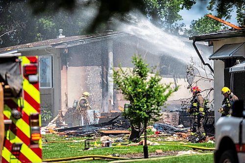 MIKAELA MACKENZIE / FREE PRESS

Fire crews at the scene of a house explosion on Camrose Bay in Transcona on Wednesday, June 26, 2024.

For Malak story.

