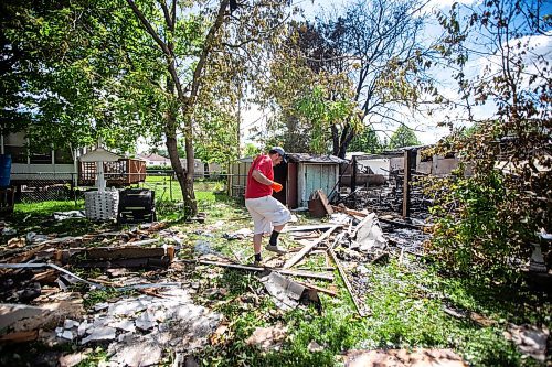 MIKAELA MACKENZIE / FREE PRESS

Marc Carroll steps through debris in his parents&#x560;backyard, which backs onto the house that exploded on Camrose Bay, in Transcona on Wednesday, June 26, 2024.

For Malak story.

