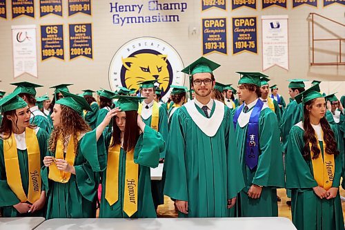 26062024
Graduates get ready for the processional during &#xc9;cole secondaire Neelin High School&#x2019;s 2024 Convocation at the Brandon University Healthy Living Centre on Wednesday.
(Tim Smith/The Brandon Sun)