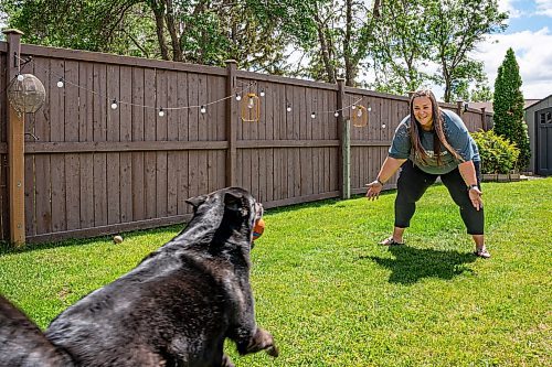 NIC ADAM / FREE PRESS
Manitoba Underdogs Rescues mission is to rescue, rehabilitate, care for, and ultimately seek out permanent and loving homes for Manitoba&#x2019;s unwanted animals.
Manitoba Underdogs Rescue Events Coordinator, Tara Maslowsky, and her 4-year-old husky-lab, Chloe, in their backyard on Wednesday afternoon.
240626 - Wednesday, June 26, 2024.

Reporter: Janine LeGal