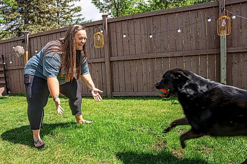 NIC ADAM / FREE PRESS
Manitoba Underdogs Rescues mission is to rescue, rehabilitate, care for, and ultimately seek out permanent and loving homes for Manitoba&#x2019;s unwanted animals.
Manitoba Underdogs Rescue Events Coordinator, Tara Maslowsky, and her 4-year-old husky-lab, Chloe, in their backyard on Wednesday afternoon.
240626 - Wednesday, June 26, 2024.

Reporter: Janine LeGal