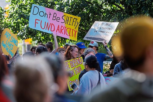 MIKE DEAL / FREE PRESS
Supporters of community organizations like ArtCity and Graffiti Gallery rally at City Hall in an effort to reverse a proposed 62% cut to the Community Grants fund.  This is a $2.1 million cut from a $3.4 million budget.
240627 - Thursday, June 27, 2024.