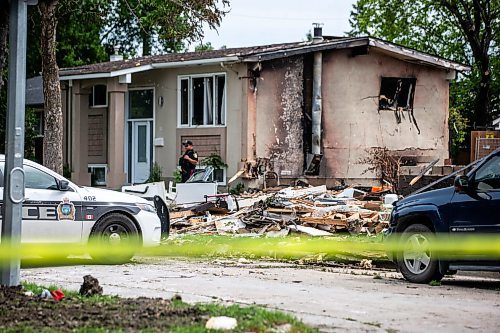 MIKAELA MACKENZIE / FREE PRESS

Police survey the rubble where a house exploded yesterday on Camrose Bay in Transcona on Thursday, June 27, 2024.

For &#x2014; story.

