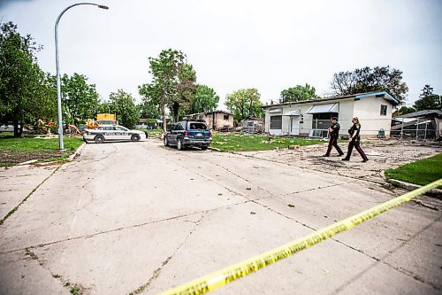 MIKAELA MACKENZIE / FREE PRESS

Police survey the rubble where a house exploded yesterday on Camrose Bay in Transcona on Thursday, June 27, 2024.

For &#x2014; story.

