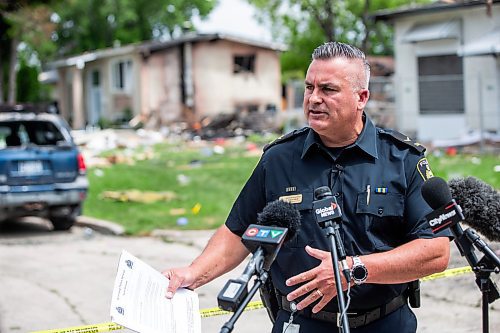 MIKAELA MACKENZIE / FREE PRESS

Constable Jason Michalyshen speaks to the media in front of the rubble where a house exploded yesterday on Camrose Bay in Transcona on Thursday, June 27, 2024.

For &#x460;story.

