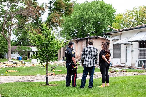 MIKAELA MACKENZIE / FREE PRESS

Police survey the rubble where a house exploded yesterday on Camrose Bay in Transcona on Thursday, June 27, 2024.

For &#x2014; story.

