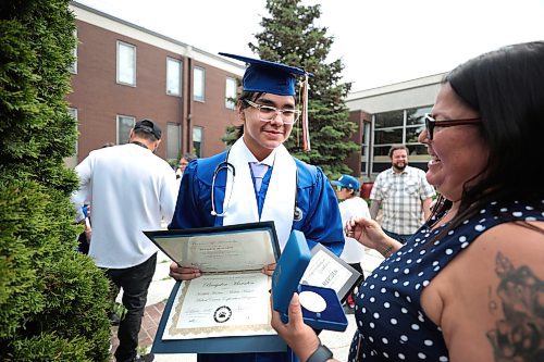 Ruth Bonneville / Free Press

Standup. - RB Russell Graduation pics

R.B. Russell grade 12 High School student, Brayden Marsden's mom, Heather McLean,  proudly holds her son's Governor General's Award along with his other awards he received while attending his graduation Commencement Ceremony with fellow students at the school Thursday.  

Brayden Marsden not only received his grade 12 diploma but also the Governor General's Award, School Board Book Award and was given a stethiscope due to his appetite in science and his plans to attend medical school in the fall.   


June 27tth, 2024