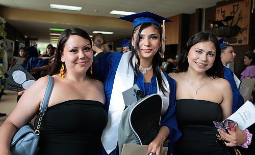 Ruth Bonneville / Free Press

Standup. - RB Russell Graduation pics

R.B. Russell grade 12,  High School student, Driana Baptiste takes photos with her two sisters, Emily (left) and Isabella after her graduation Commencement Ceremony where she received an Academic Achievement Award as well as her diploma at the school Thursday. 





June 27tth, 2024