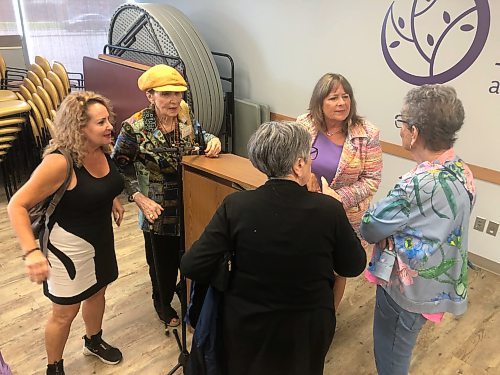 Gail Asper (second from right) talks with audience members at the Gwen Secter Creative Living Centre after her presentation about the Ten Commandments monument. (John Longhurst / Free Press)