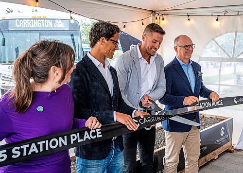 NIC ADAM / FREE PRESS
Carrington’s President Jared Carrington cuts the ribbon at Carrington Real Estate’s official sod-turning for a high-rise near Jubilee Station on Friday morning.
(l-r) Coun. Sherri Rollins, business partner Sam Goszer, Carrington and Mayor Scott Gillingham.
240628 - Friday, June 28, 2024.

Reporter: Gabby Piche