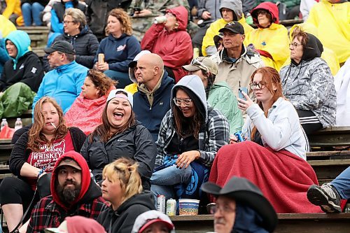 Bundled-up fans watch Quinton Blair perform on the mainstage. (Tim Smith/The Brandon Sun)