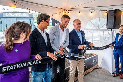 NIC ADAM / FREE PRESS

Carrington’s President Jared Carrington cuts the ribbon at Carrington Real Estate’s official sod-turning for a high-rise near Jubilee Station on Friday morning.
(l-r) Coun. Sherri Rollins, business partner Sam Goszer, Carrington and Mayor Scott Gillingham.

240628 - Friday, June 28, 2024.

Reporter: Gabby Piche