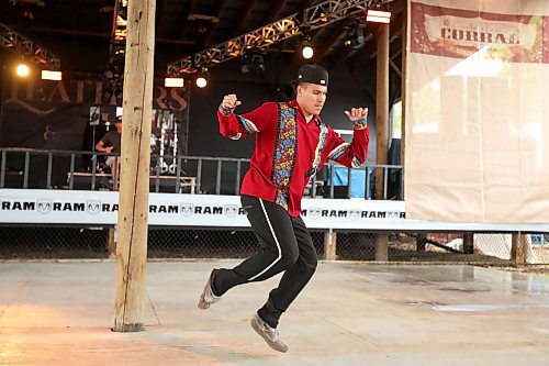 28062024
Jacob Harris of the Ivan Flett Memorial Dancers, performs during Dauphin&#x2019;s Countryfest on a wet Friday afternoon. (Tim Smith/The Brandon Sun)