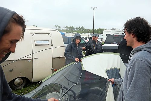 28062024
Festival-goers set up camp during pouring rain at Dauphin&#x2019;s Countryfest on Friday afternoon. (Tim Smith/The Brandon Sun)