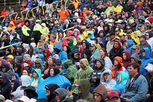 28062024
Bundled-up fans watch The Great Canadian Roadtrip featuring Doc Walker, Michelle Wright and Jason McCoy perform on the mainstage at Dauphin&#x2019;s Countryfest on a cool Friday evening. (Tim Smith/The Brandon Sun)