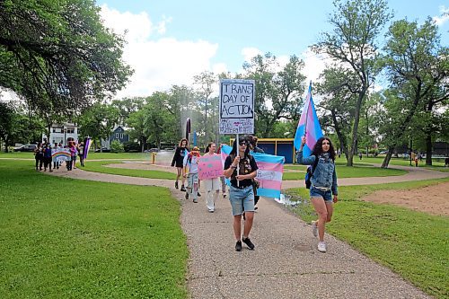 Rudy Wilder (left) and Leila Praznik (right) lead a group out of Stanley Park on Saturday morning for Brandon's first Trans Day of Action march. (Colin Slark/The Brandon Sun)