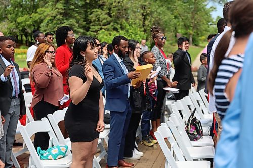 Candidates take the Canadian oath of citizenship at a ceremony at the International Peace Garden. (Charlotte McConkey/The Brandon Sun)