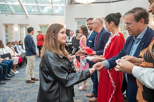 BROOK JONES / FREE PRESS
A CanadIan citizenship ceremony was hosted on Canada Day at the Pavilion at Assiniboine Park in Winnipeg, Man., Monday, July 1, 2024. Pictured: MP for Charleswood-St. James-Assiniboia-Headingley Marty Morantz (right) shakes hands with a new Canadian citizen following the oath of citizenship.