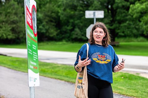 MIKAELA MACKENZIE / FREE PRESS

Visitor Anah Rempel talks about coyote warning signs at Assiniboine Park on Tuesday, July 2, 2024. 

For Malak story.

