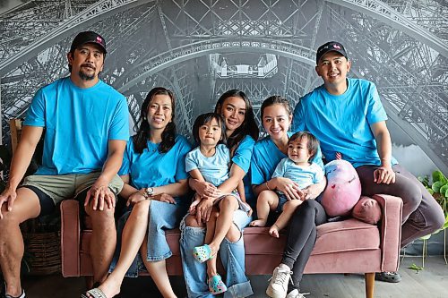 Brian Apostol, Ivy Elizalde, Marnella Elizalde, Lovelia Elizalde, Adrian Fermin, along with four-year-old Marvella Apostol and one-year-old Saliah Fermin, are bringing the Taste of Brandon festival back to the Wheat City. The July 13 celebration will include food, music and other entertainment at the Riverbank Discovery Centre. (Tim Smith/The Brandon Sun)