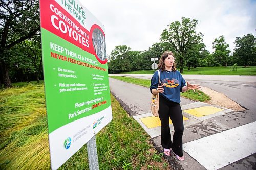 MIKAELA MACKENZIE / FREE PRESS

Visitor Anah Rempel talks about coyote warning signs at Assiniboine Park on Tuesday, July 2, 2024. 

For Malak story.

