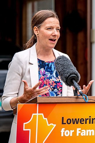 NIC ADAM / FREE PRESS
Environment and Climate Change Minister Tracy Schmidt speaks to press about Manitobas new electric vehicle rebate program in front of the home of EV owner Shelley Kowalchuck Tuesday.
240702 - Tuesday, July 02, 2024.

Reporter: Martin Cash