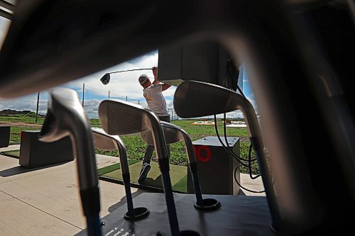 02072024
Riley Parker hits ball at Shanks Driving Range &amp; Grill on a warm Tuesday morning. 
(Tim Smith/The Brandon Sun)