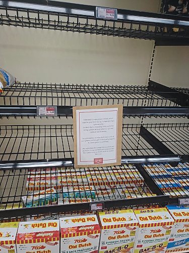 Some shelves are empty at the Heritage Co-op Store at 1035 Richmond Ave. on Wednesday afternoon. A notice to customers explains that a "cybersecurity incident ... is impacting some customer-facing systems at local retail co-ops and card lock fuel locations.” (Abiola Odutola/The Brandon Sun)