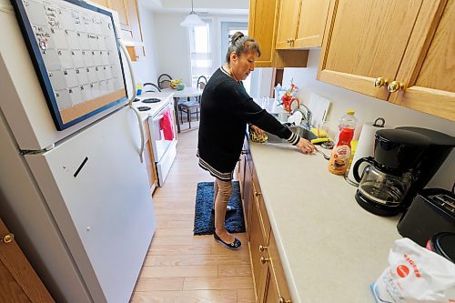 MIKE DEAL / FREE PRESS
Resident, Priscilla Kent in her apartment where she has been staying for about a month.
Aurora Reunification Village, 873 Waverley Street, a private reunification centre that helps people in addictions treatment work towards building a life that includes their children.  
See Katie May story
240703 - Wednesday, July 03, 2024.