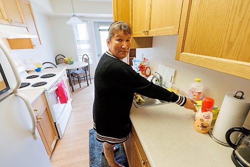 MIKE DEAL / FREE PRESS
Resident, Priscilla Kent in her apartment where she has been staying for about a month.
Aurora Reunification Village, 873 Waverley Street, a private reunification centre that helps people in addictions treatment work towards building a life that includes their children.  
See Katie May story
240703 - Wednesday, July 03, 2024.