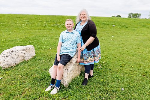 MIKE DEAL / FREE PRESS
Amie Cowan with her son, Mason Cowan-Miller, 13. Mason is attending Camp Manitou this year thanks to the Winnipeg Free Press Sunshine Fund. 
240703 - Wednesday, July 03, 2024.