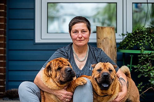 MIKAELA MACKENZIE / FREE PRESS

Long haul trucker and dog shower Devi Gershbain and her dogs, Ever and Radar, at home in Winnipeg on Wednesday, July 3, 2024. The CDC is changing the rules on bringing dogs across the Canada/U.S. border, which will impact the trucking, show dog and breeder communities. 

For Jura story.

