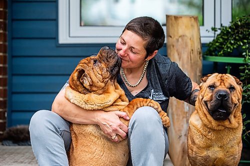 MIKAELA MACKENZIE / FREE PRESS

Long haul trucker and dog shower Devi Gershbain and her dogs, Ever and Radar, at home in Winnipeg on Wednesday, July 3, 2024. The CDC is changing the rules on bringing dogs across the Canada/U.S. border, which will impact the trucking, show dog and breeder communities. 

For Jura story.

