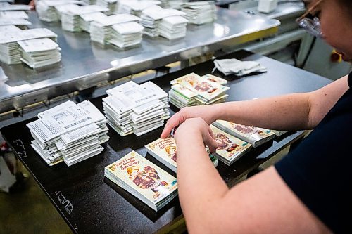 MIKAELA MACKENZIE / FREE PRESS

Jorlyn Lumbang works in the finishing department at Pollard Banknote in Winnipeg on Wednesday, July 3, 2024. The company partners with lotteries around the world to design, market, and print lottery games.

For Aaron story.

