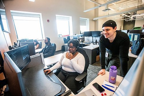 MIKAELA MACKENZIE / FREE PRESS

Application developers Chikamnaele Ngene (left) and Maxim Abdulkhalikov at Pollard Banknote in Winnipeg on Wednesday, July 3, 2024. The company partners with lotteries around the world to design, market, and print lottery games.

For Aaron story.

