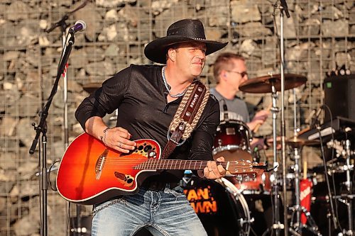 Manitoba country musician Ryan Keown and his band perform for a large crowd at the Fusion Credit Union Stage at the Riverbank Discovery Centre on Thursday evening as part of the Music in the Park series. (Tim Smith/The Brandon Sun)