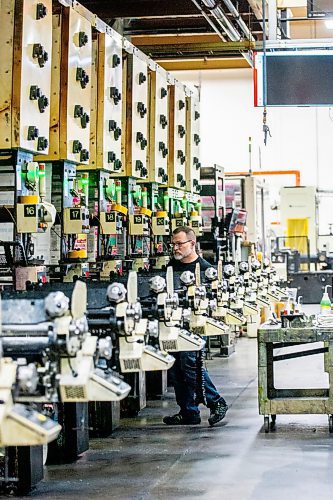 MIKAELA MACKENZIE / FREE PRESS

Press operator Calvin Slessor does maintenance on the presses at Pollard Banknote in Winnipeg on Wednesday, July 3, 2024. The company partners with lotteries around the world to design, market, and print lottery games.

For Aaron story.

