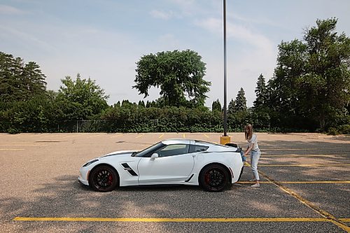 04072024
Haley Foxton polishes her 2018 Corvette Grand Sport in the parking lot of Landmark Cinemas on Thursday, scrubbing off the bugs from her highway travels. Foxton was debating taking in the Downtown Cruise Night with her car. 
(Tim Smith/The Brandon Sun)