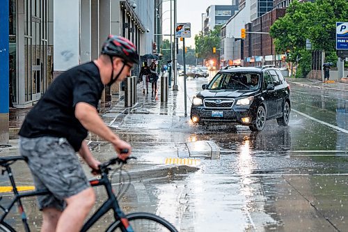 NIC ADAM / FREE PRESS
The corner of Smith Street and Graham Avenue on a rainy Thursday afternoon.
240704 - Thursday, July 04, 2024.

Reporter: