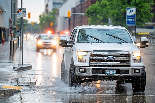 NIC ADAM / FREE PRESS
The corner of Smith Street and Graham Avenue on a rainy Thursday afternoon.
240704 - Thursday, July 04, 2024.

Reporter: