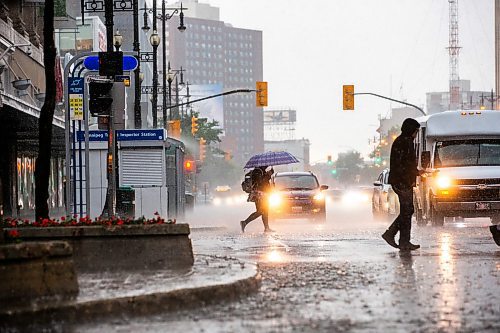 MIKAELA MACKENZIE / FREE PRESS

Thunderstorms drench pedestrians in downtown Winnipeg on Thursday, July 4, 2024. 

Standup.

