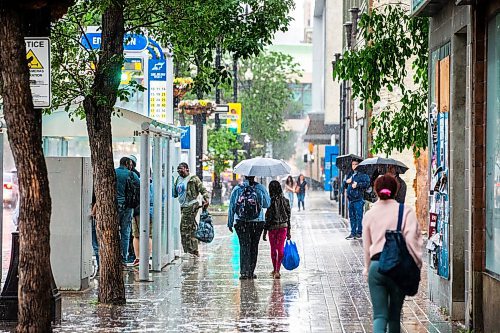 MIKAELA MACKENZIE / FREE PRESS

Thunderstorms drench pedestrians in downtown Winnipeg on Thursday, July 4, 2024. 

Standup.

