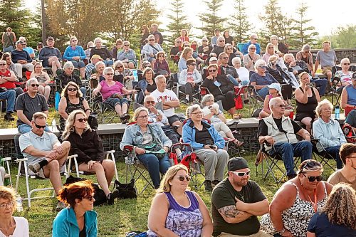 04072024
Brandonites watch and listen as Manitoba Country musician Ryan Keown and his band perform at the Fusion Credit Union Stage at the Riverbank Discovery Centre on Thursday evening as part of the Music in the Park series. 
(Tim Smith/The Brandon Sun)