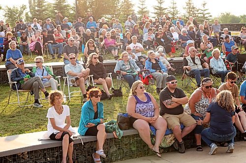 04072024
Brandonites watch and listen as Manitoba Country musician Ryan Keown and his band perform at the Fusion Credit Union Stage at the Riverbank Discovery Centre on Thursday evening as part of the Music in the Park series. 
(Tim Smith/The Brandon Sun)