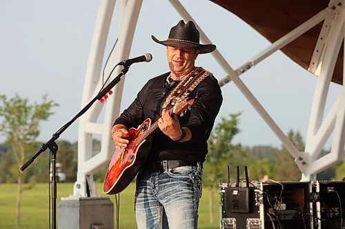 04072024
Manitoba Country musician Ryan Keown and his band perform for a large crowd at the Fusion Credit Union Stage at the Riverbank Discovery Centre on Thursday evening as part of the Music in the Park series. 
(Tim Smith/The Brandon Sun)