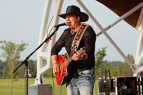 04072024
Manitoba Country musician Ryan Keown and his band perform for a large crowd at the Fusion Credit Union Stage at the Riverbank Discovery Centre on Thursday evening as part of the Music in the Park series. 
(Tim Smith/The Brandon Sun)