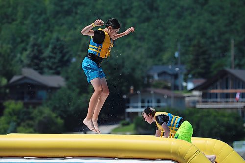 05072024
Cash Coleman and Coel Furtney play at the Splish Splash Water Park on Minnedosa Lake on a hot Friday afternoon.
(Tim Smith/The Brandon Sun)