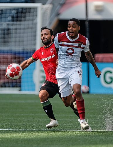 JOHN WOODS / FREE PRESS
Valour FC Dante Campbell (6) attacks against Calvary FC Sergio Camargo (10) in Winnipeg Sunday, July 7, 2024. 

Reporter: ?